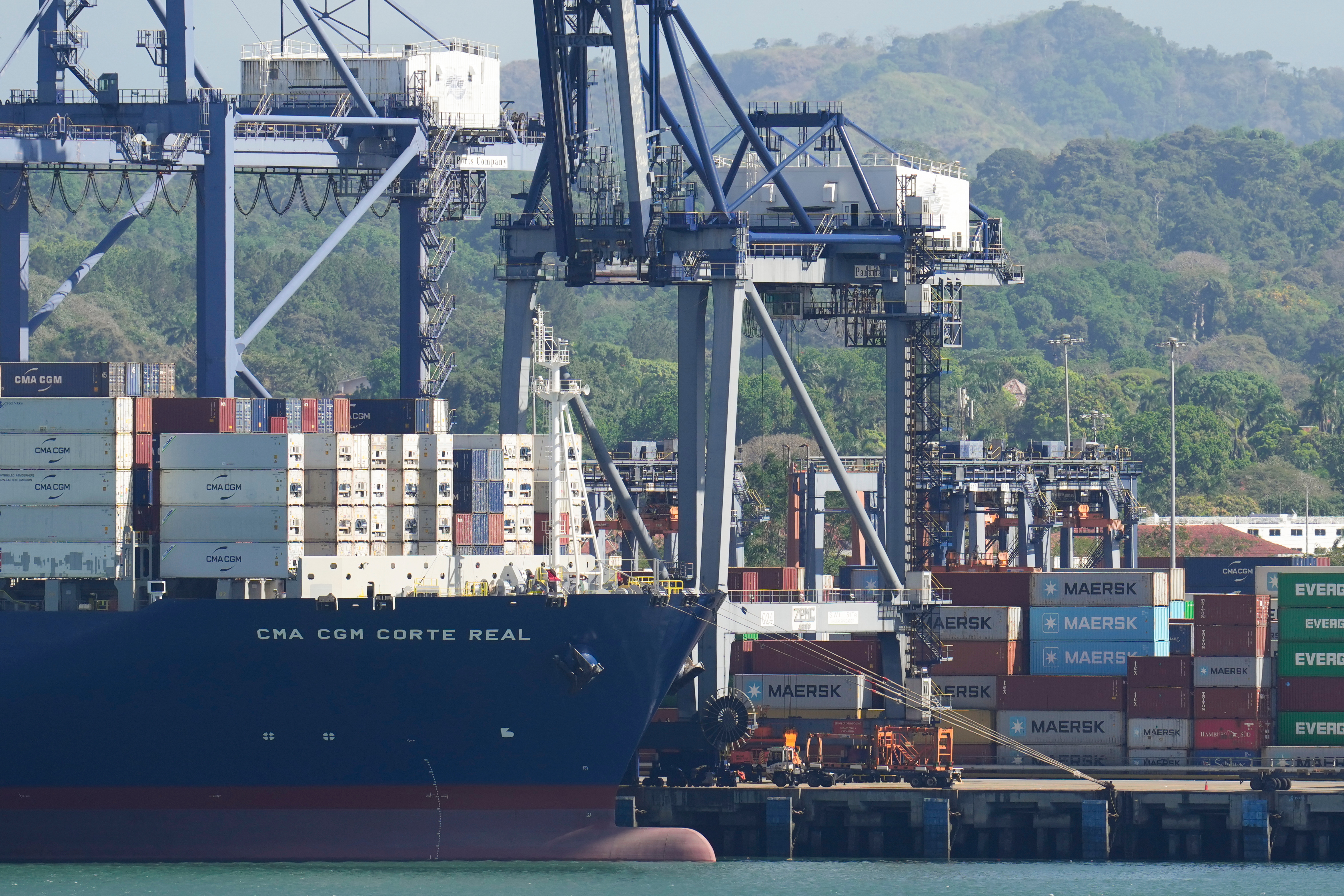 Cranes load a cargo ship at the Panama Canal's Port of Balboa, Panama City, Jan. 30, 2026.