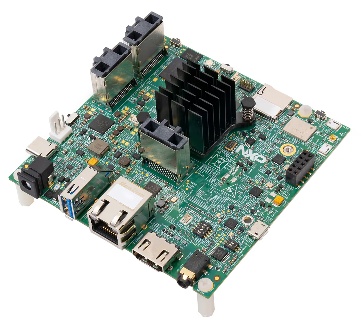 Green circuit board motherboard with black heatsink, multiple connectors, and integrated electronic components
