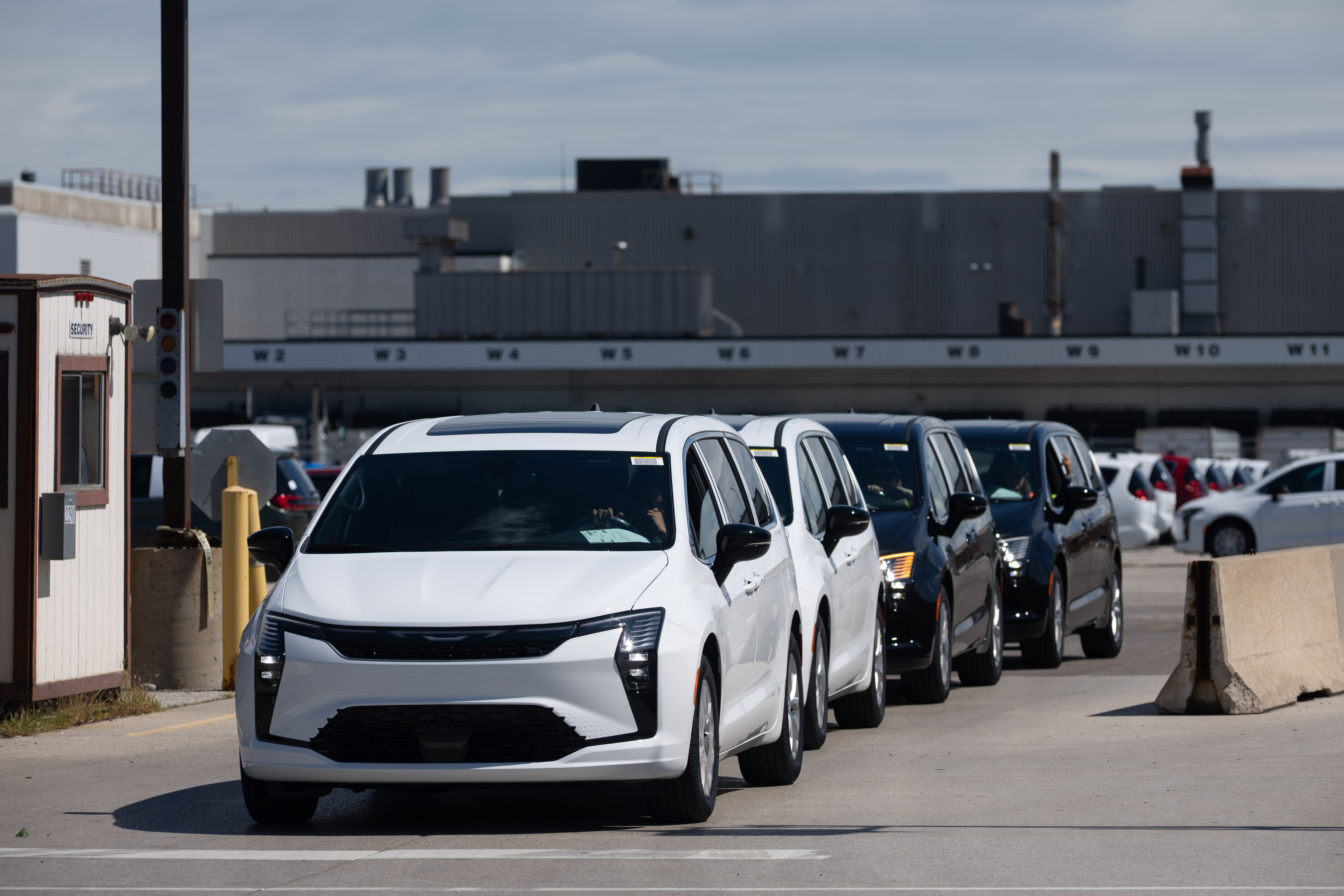 Chrysler Pacificas are driven off the lot at Windsor Assembly Plant in Windsor, Ontario, Canada, on Monday, Aug. 24, 2026.