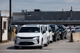 Chrysler Pacificas are driven off the lot at Windsor Assembly Plant in Windsor, Ontario, Canada, on Monday, Aug. 24, 2026.