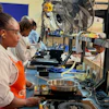 Workers assemble fuel-efficient cookstoves at BURN, a manufacturer of clean cooking appliances, Kiambu, Kenya, July 31, 2026.