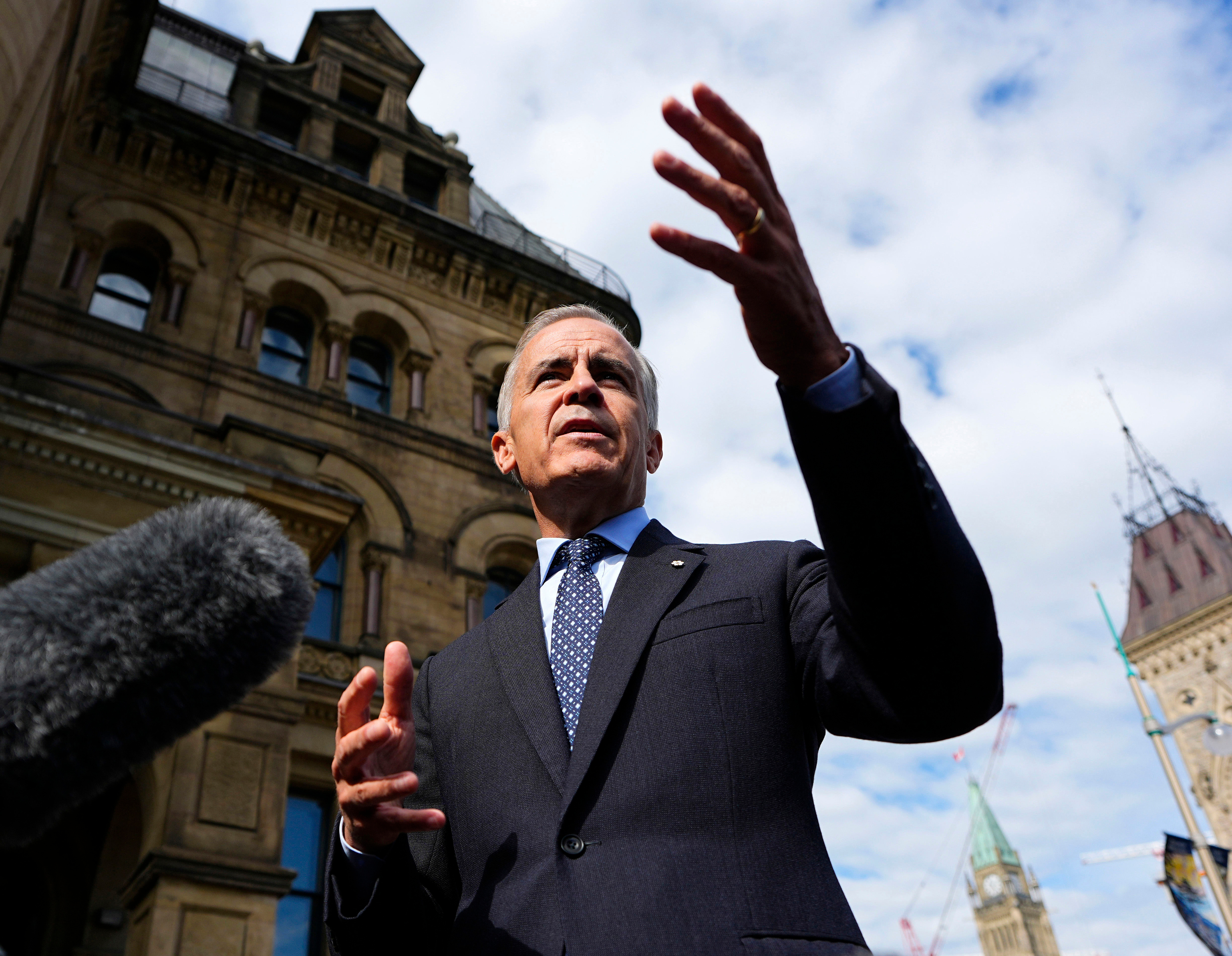 Canadian Prime Minister Mark Carney speaks to journalists as he arrives at the Office of the Prime Minister and Privy Council in Ottawa, Sept. 1, 2026.