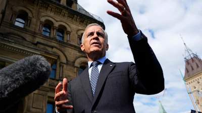 Canadian Prime Minister Mark Carney speaks to journalists as he arrives at the Office of the Prime Minister and Privy Council in Ottawa, Sept. 1, 2026.