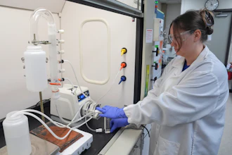 Stephanie Stoll starts a pump as part of an experiment studying the removal of PFAS from water samples at a U.S. Environmental Protection Agency lab in Cincinnati, April 10, 2024.