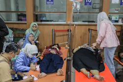 Students who fell ill, allegedly due to food poisoning after consuming free meals at their school, receive medical treatment at a hospital in Sidoarjo, East Java, Indonesia, Sept. 2, 2026.