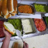 A cook prepares 'completos' at a restaurant in Santiago, Chile, Sept. 14, 2026.