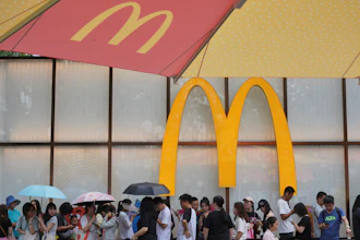 People line up to enter a McDonald's restaurant in Beijing, Aug. 20, 2025.