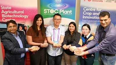 Professor Rajeev Varshey FRS FAA, CCFI co-authors and lab members display peanuts at STOC Plant 2026.