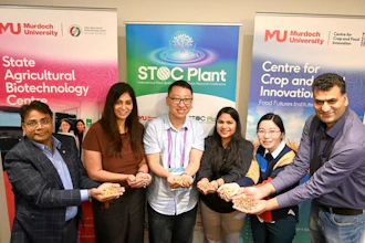 Professor Rajeev Varshey FRS FAA, CCFI co-authors and lab members display peanuts at STOC Plant 2026.