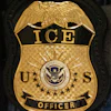 A federal agent wears an Immigration and Customs Enforcement badge in New York, June 10, 2025.