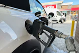 A motorist fills up at a QuikTrip gas station, Sept. 15, 2026, Greenwood Village, Colo.