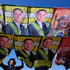 A street vendor sells campaign flags of presidential candidates Sen. Flavio Bolsonaro and current President Luiz Inacio Lula da Silva, Brasilia, Brazil, Sept. 29, 2026.
