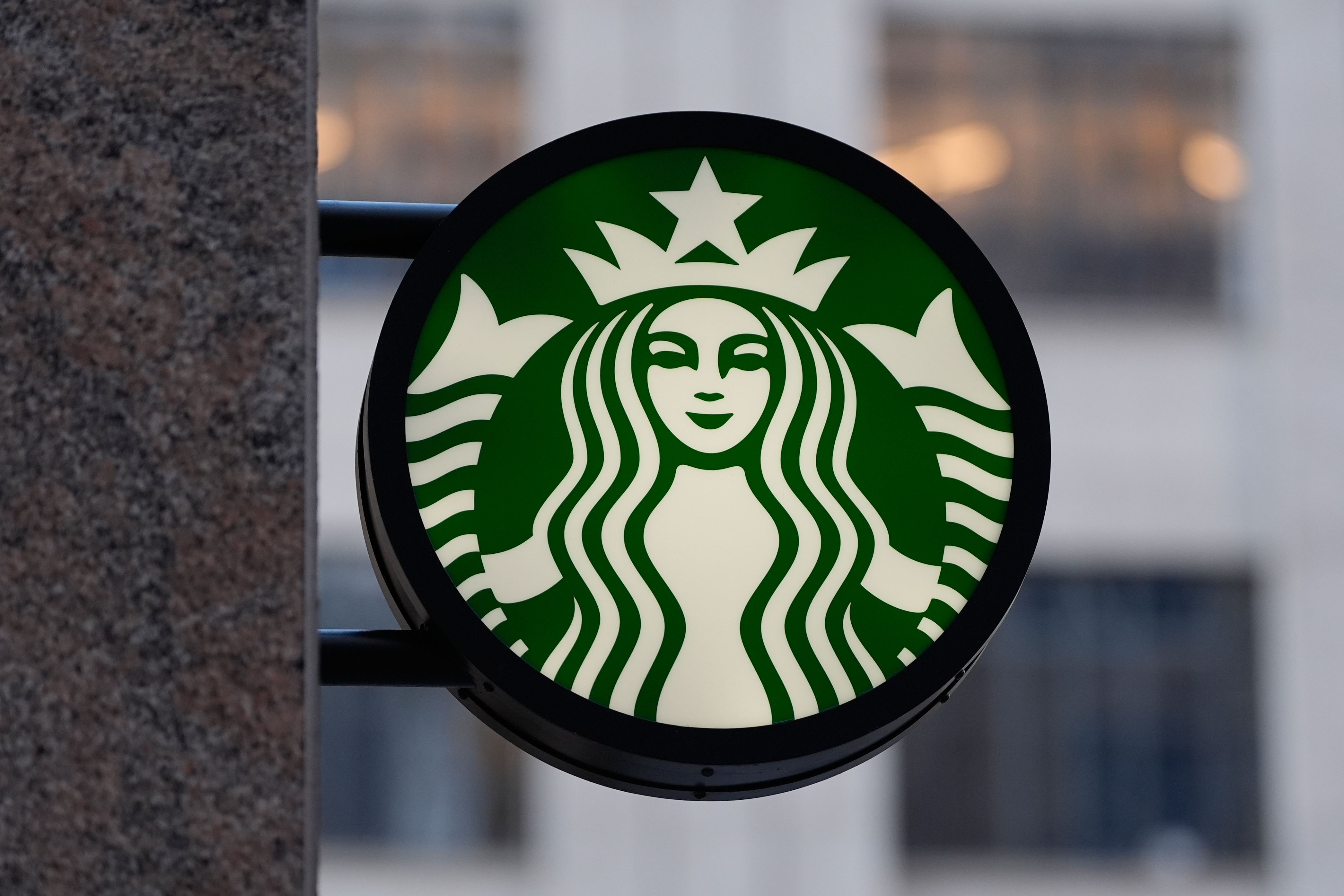 The Starbucks logo is displayed on a coffee shop, Nov. 24, 2025, Boston.
