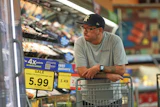 A shopper looks the meat section of a grocery story in Fort Worth, Texas, Oct. 7, 2026.