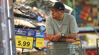 A shopper looks the meat section of a grocery story in Fort Worth, Texas, Oct. 7, 2026.