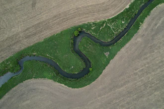 A stream cuts through a farm field near Marshalltown, Iowa, May 7, 2026.