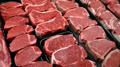 Steaks and other beef products are displayed for sale at a grocery store in McLean, Va., Jan. 18, 2010.