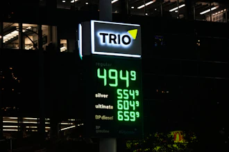 Gas prices are shown at a station in Chicago, Oct. 14, 2026.