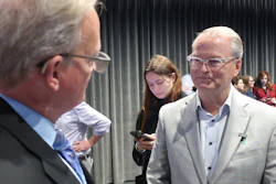 Democratic Senate nominee Adam Hamilton, right, speaks with Curtis Sneden, president and CEO of the Metropolitan Topeka Airport Authority, Oct. 16, 2026, Topeka, Kan.