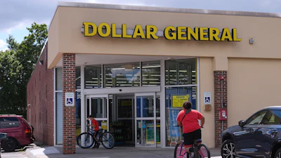 Children ride their bicycles to the Dollar General store, Aug. 21, 2025, Nashua, N.H.