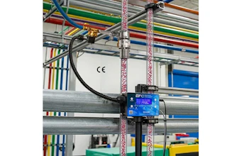 EFC blue control device mounted on industrial factory equipment with colorful overhead cables and structural beams