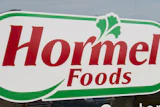Hormel Foods storefront sign with red text and green decorative border featuring parsley leaf icon